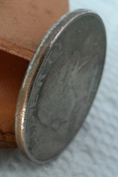 Extreme-Rim-Wear-On-A-Washington-Quarter